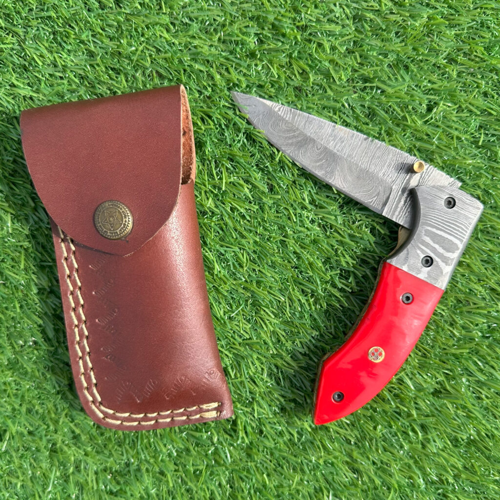 Complete Damascus knife set with handcrafted leather sheath and brass button