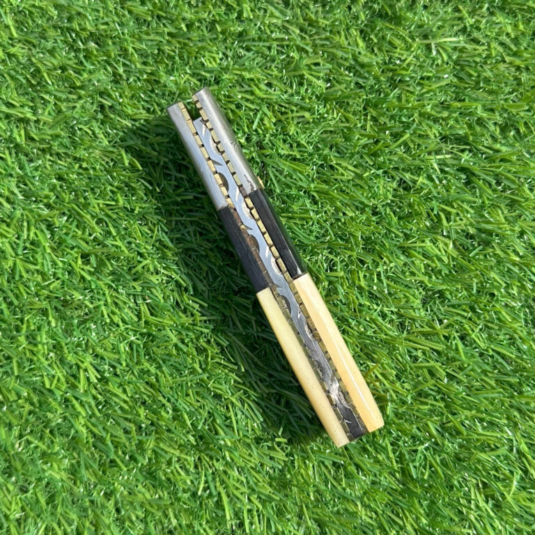 Damascus steel folding knife closed position displaying Texas patriotic design