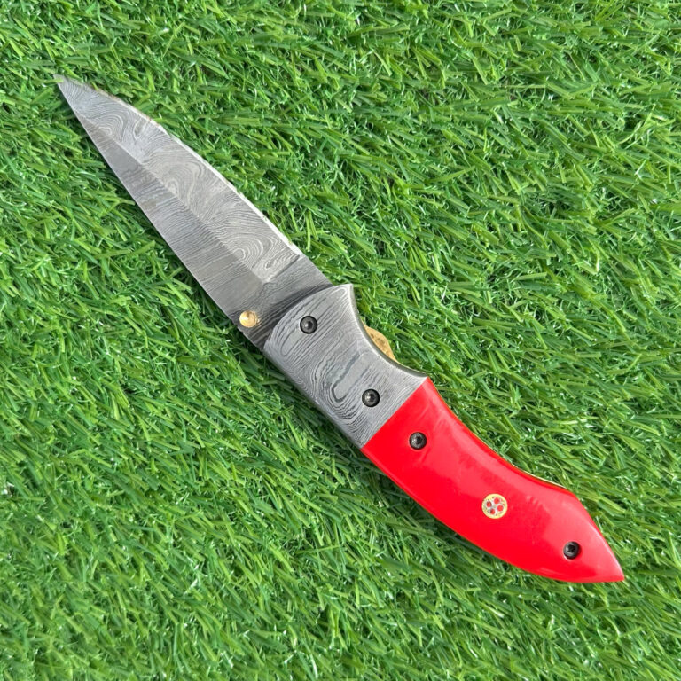 Full Damascus folding knife open position showcasing complete blade pattern