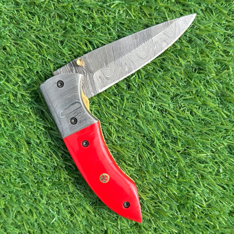 Hand forged Damascus blade fully opened showing unique Damascus steel pattern