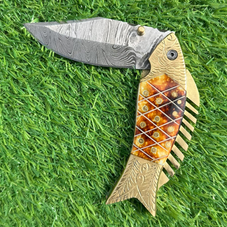 Leather knife sheath back showing belt loop and yellow decorative stitching